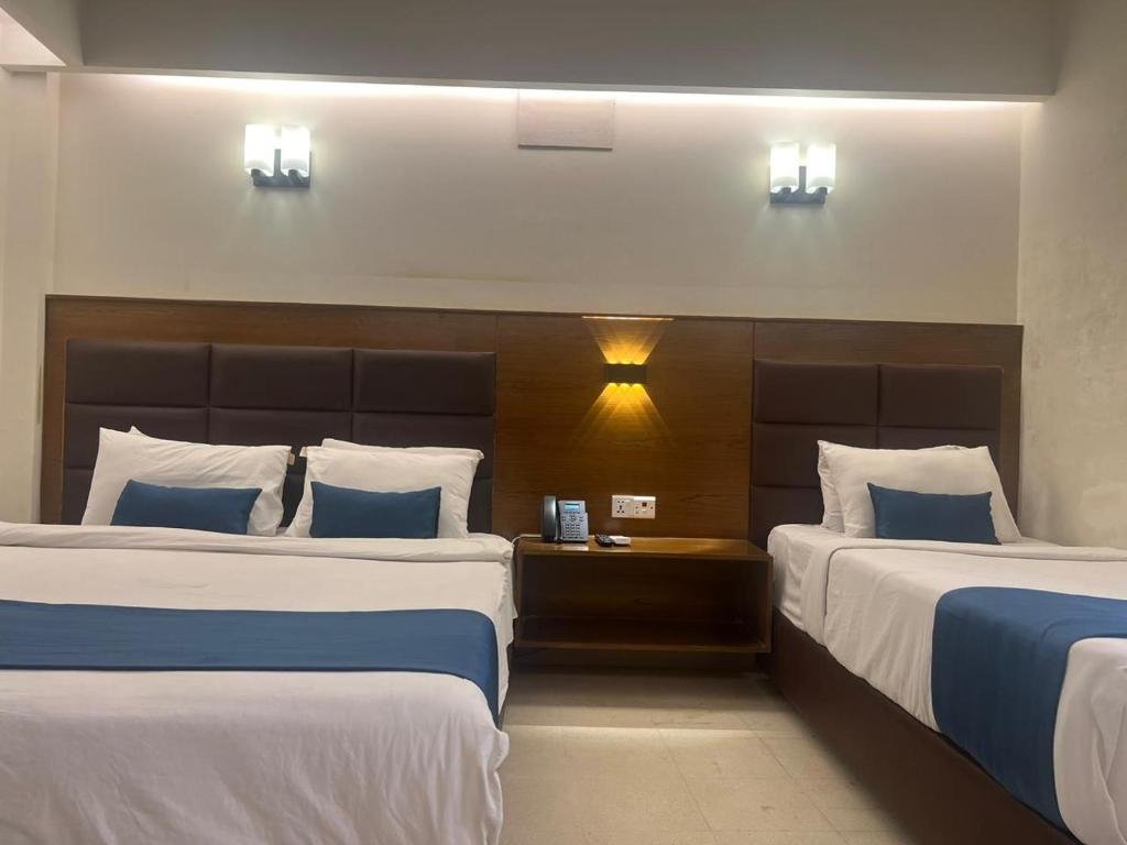 Standard Triple Room – Comfortable Stay with City Views